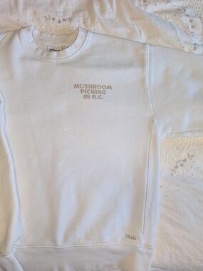 TNA White Crewneck Sweatshirt with Beige 'Mushroom Picking in B.C.' Print